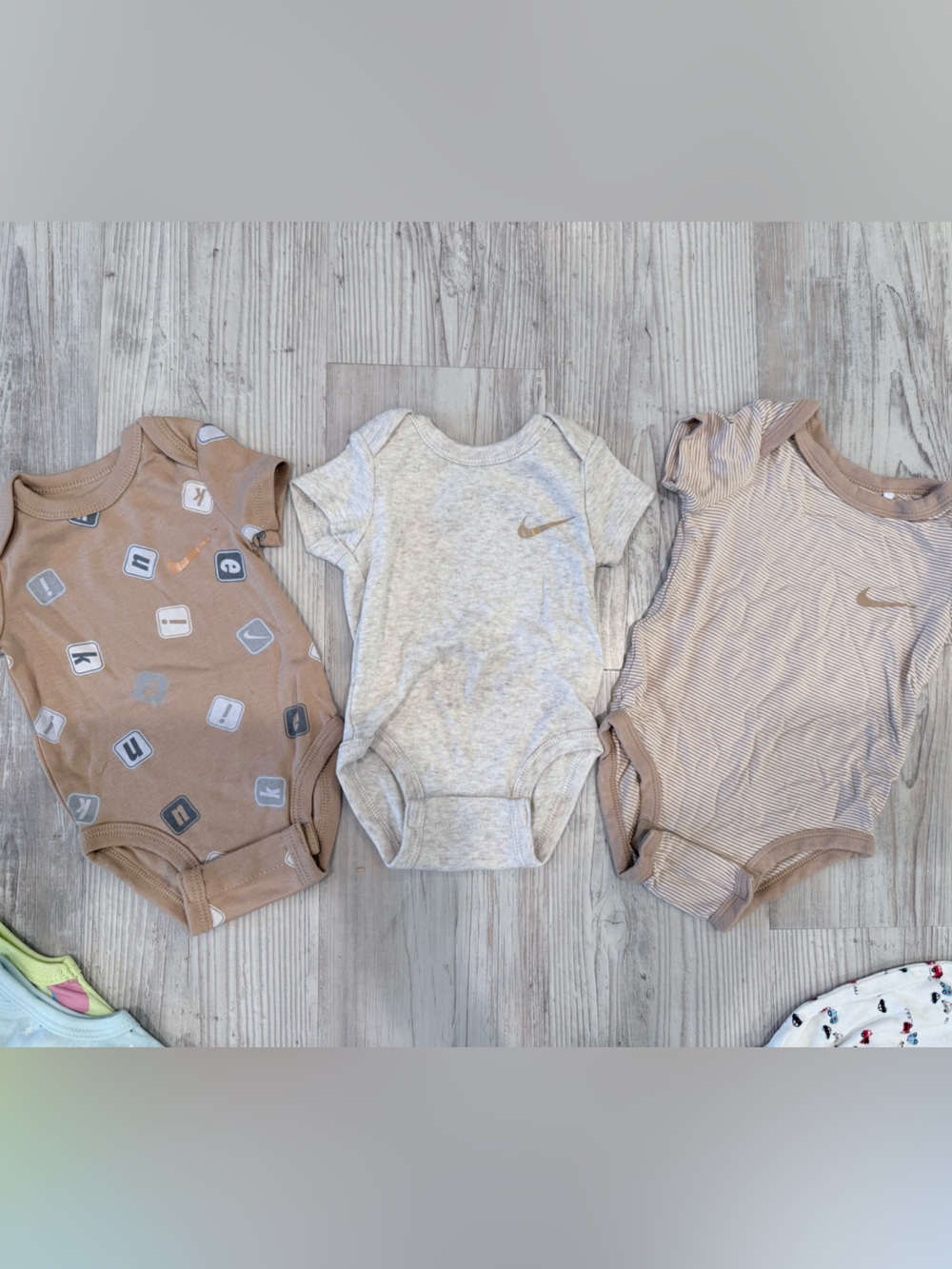Nike Neutral Infant Bodysuit in Cream, Light Gray, Tan